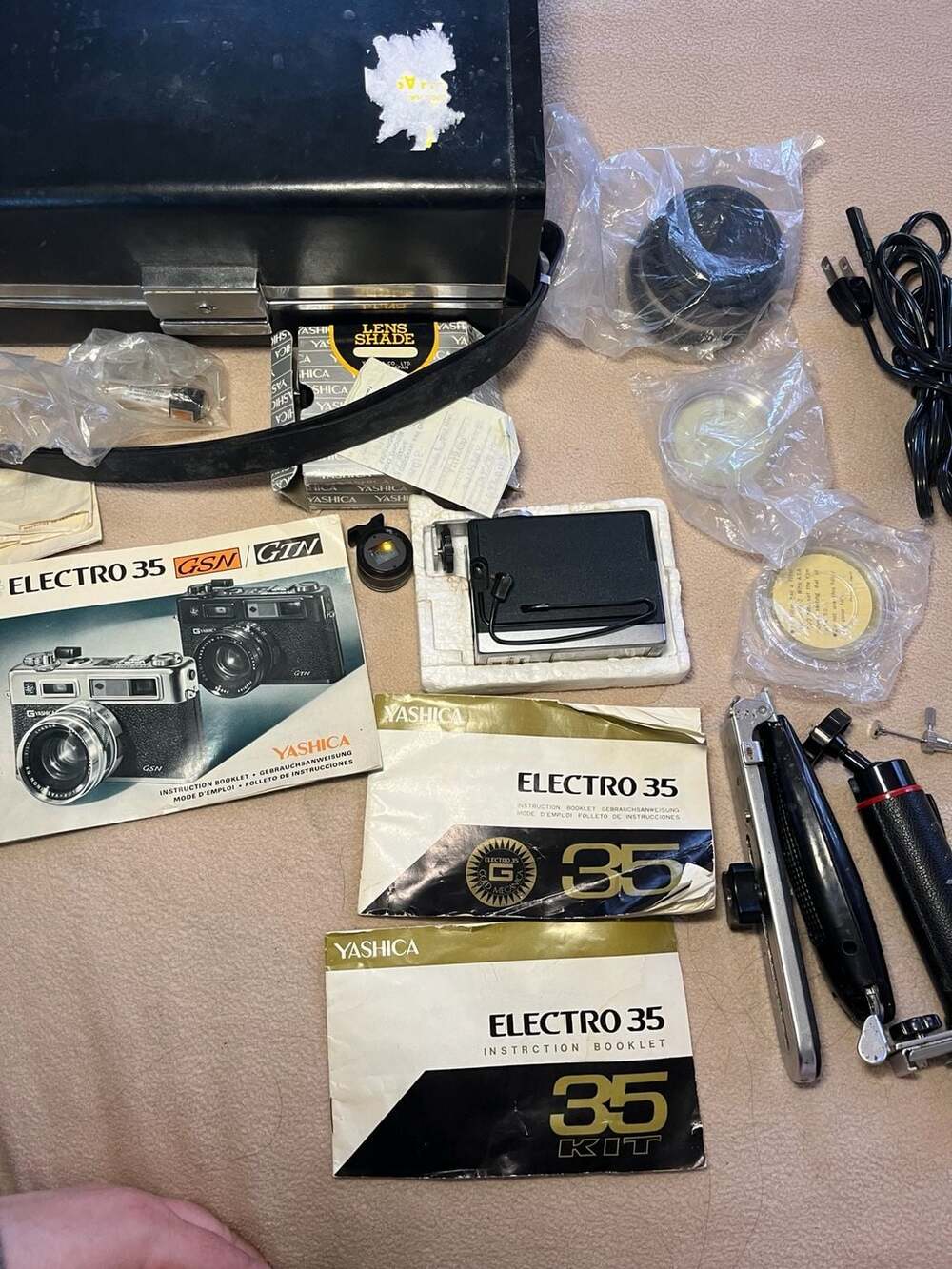 Vintage Yashica Camera Accessory Bundle with Case, Flash, and Manuals